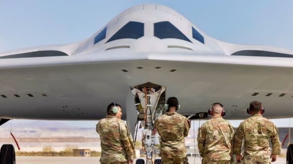 U.S. Air Force Airmen with the 912th Aircraft Maintenance Squadron prepare to recover the second B-21 Raider to arrive for test and evaluation at Edwards AFB, Calif., Sept. 11, 2025. The arrival of a second test aircraft provides maintainers valuable hands-on experience with tools, data and processes that will support future operational squadrons. (U.S Air Force photo by Kyle Brasier)