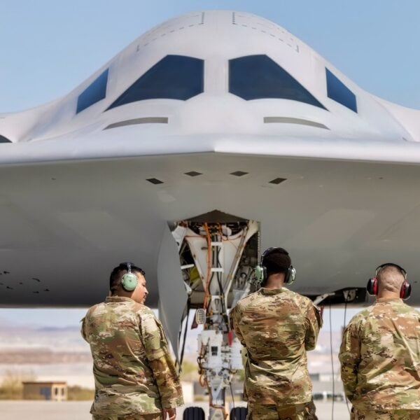 U.S. Air Force Airmen with the 912th Aircraft Maintenance Squadron prepare to recover the second B-21 Raider to arrive for test and evaluation at Edwards AFB, Calif., Sept. 11, 2025. The arrival of a second test aircraft provides maintainers valuable hands-on experience with tools, data and processes that will support future operational squadrons. (U.S Air Force photo by Kyle Brasier)