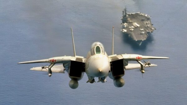 F-14 Tomcat Flying Near Aircraft Carrier