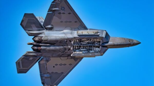 U.S. Air Force Maj. Joshua “Cabo” Gunderson, F-22 Raptor Demonstration Team commander and pilot, preforms the weapons bay door pass during rehearsal for the 2022 FIDAE Air & Trade Show, April 3, 2022 in Santiago, Chile. The F-22 Raptor is a multi-role air dominance stealth fighter that can carry of combination of air-to-air missiles and GPS guided bombs. (U.S. Air Force photo by Staff Sgt. Don Hudson)