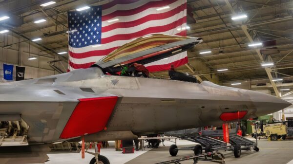 An F-22A Raptor sits in a hangar during a load competition on Joint Base Elmendorf-Richardson, Alaska, Jan. 23, 2026. Load competitions test Airmen’s ability to safely and efficiently build munitions, strengthening readiness for real-world taskings. (U.S. Air Force photo by Airman 1st Class Theodore Gowdy)