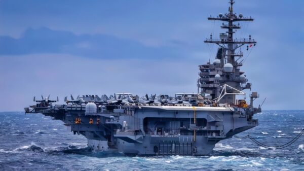 The Nimitz-class aircraft carrier USS George H.W. Bush (CVN 77) and the Henry J. Kaiser-class fleet replenishment oiler USNS John Lenthall (TAO 189) transfer cargo and JP-5 during a replenishment at sea in the Atlantic Ocean, Feb. 15, 2026. The George H.W. Bush Carrier Strike Group is at sea training as an integrated warfighting team. Composite Training Unit Exercise (COMPTUEX) is the Joint Force’s most complex integrated training event and prepares naval task forces for sustained high-end Joint and combined combat. Integrated naval training provides combatant commanders and America’s civilian leaders highly capable forces that deter adversaries, underpin American security and economic prosperity, and reassure Allies and partners. (U.S. Navy photo by Mass Communication Specialist 2nd Class Mitchell Mason)