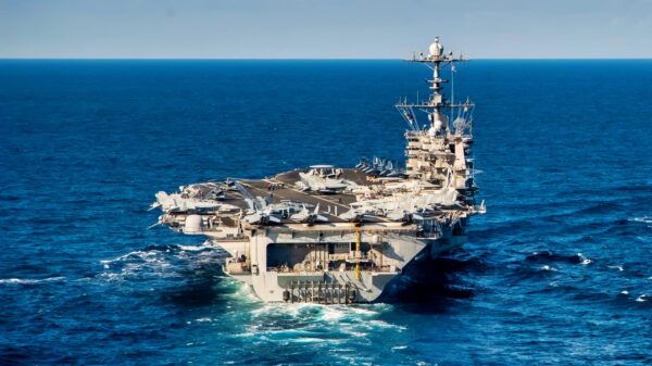 MEDITERRANEAN SEA (Jan. 22, 2021 The Arleigh Burke-class guided-missile destroyer USS Gravely (DDG 107) breaks away from the Nimitz-class aircraft carrier USS Harry S. Truman (CVN 75) following a replenishment-at-sea exercise, Jan. 22, 2022. The Harry S. Truman Carrier Strike Group is on a scheduled deployment in the U.S. Sixth Fleet area of operations in support of naval operations to maintain maritime stability and security, and defend U.S., allied and partner interests in Europe and Africa. (U.S. Navy photo by Mass Communication Specialist 3rd Class Bela Chambers)