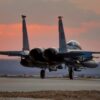 An F-15E Strike Eagle, deployed to the 332d Air Expeditionary Wing, prepares for takeoff just as the sun sets at in undisclosed location in Southwest Asia. The 332 AEW works around the clock to support Operation Inherent Resolve. (Air National Guard photo by Master Sgt. Jonathan Young)