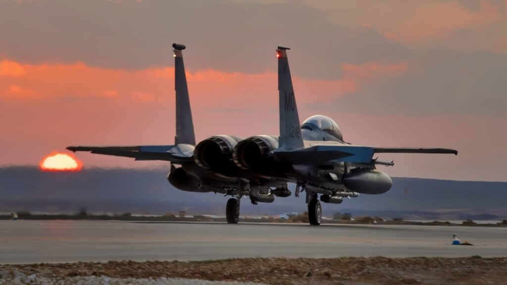 An F-15E Strike Eagle, deployed to the 332d Air Expeditionary Wing, prepares for takeoff just as the sun sets at in undisclosed location in Southwest Asia. The 332 AEW works around the clock to support Operation Inherent Resolve. (Air National Guard photo by Master Sgt. Jonathan Young)
