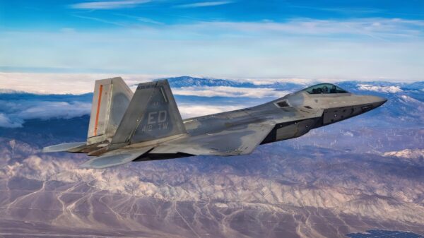 An F-22 Raptor assigned to the 411th Flight Test Squadron, Air Dominance Combined Test Force, soars over the Mojave Desert ahead of conducting high angle-of-attack maneuvers on Feb. 26, 2026. High AoA is a highly specialized set of combat aircraft maneuvers that are performed by experienced pilots and test pilots. Edwards AFB is one of the few places in North America where aviators can learn and become certified in this unique state of flying. (Courtesy photo)
