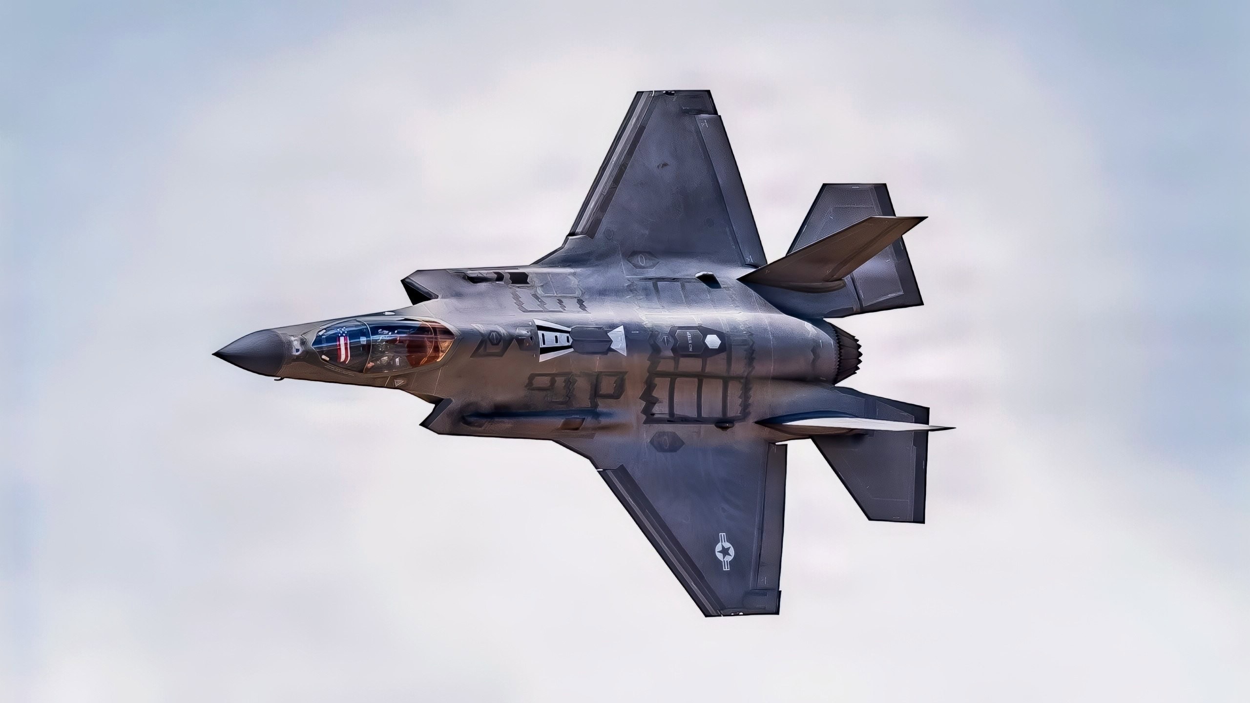 A U.S. Air Force F-35A Lightning II flies over the 56th Fighter Wing during Luke Days 2026, March 22, 2026, at Luke Air Force Base, Arizona. Luke Days 2026 highlights the precision and professionalism required to generate combat airpower and sustain the nation’s defense. Currently in operational service, the F-35A integrates stealth technology and advanced sensors to detect and defeat threats while maintaining air dominance. Opportunities for the public to see military aviation up close helps build appreciation for the readiness of the joint force. (U.S. Air Force photo by Senior Airman Belinda Guachun-Chichay)