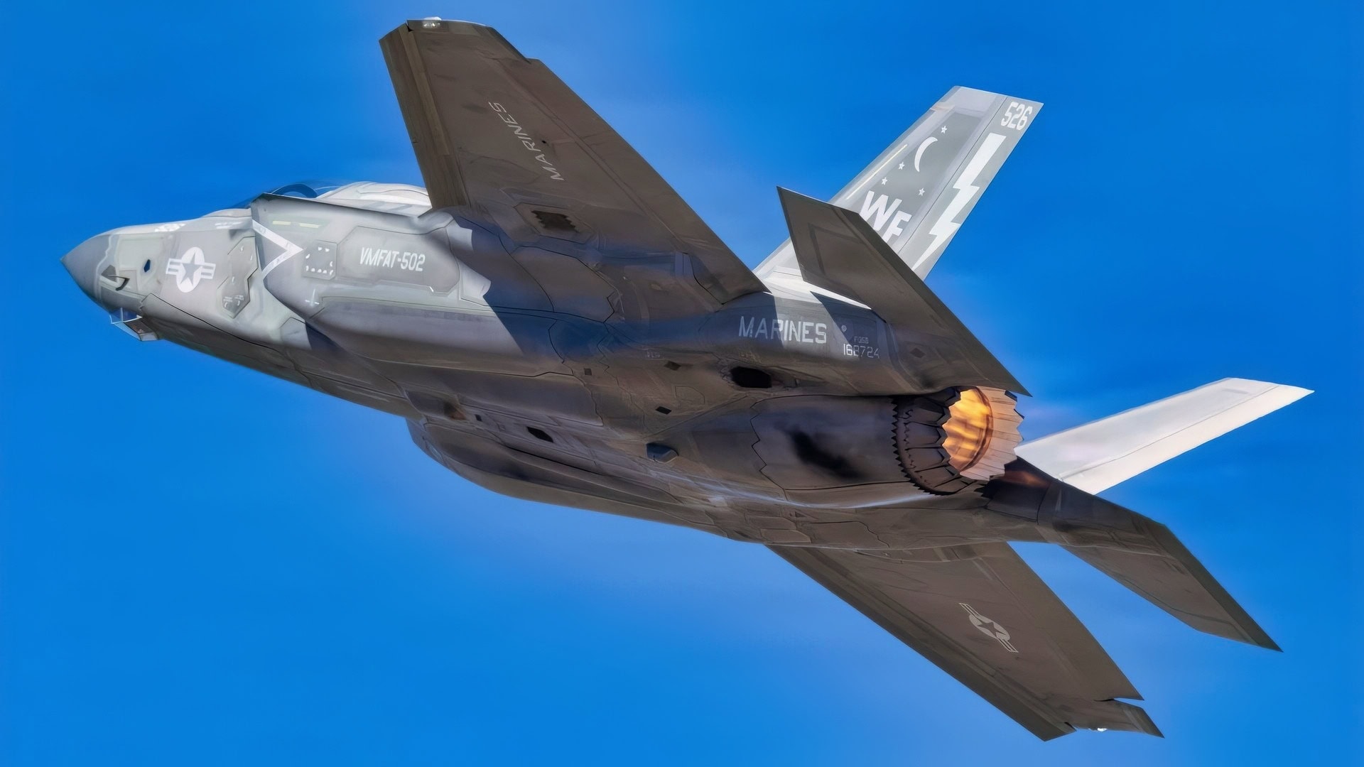 A U.S. Marine Corps F-35B Lightning II lights its afterburner and climbs during the Luke Days 2026 airshow, Saturday, March 21, 2026, at Luke Air Force Base, Arizona. The Marine Corps F-35B Lightning II demonstration showcases the maneuverability and advanced technology of a fifth-generation fighter. Demonstrations like this reflect the cutting-edge capabilities that allow the joint force to maintain air superiority in modern combat operations. (U.S. Air National Guard Photo by Tech. Sgt. Hampton Stramler)