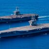 PACIFIC OCEAN (Feb. 13, 2022) Nimitz-class aircraft carriers USS Carl Vinson (CVN 70), back, and USS Nimitz (CVN 68) transit the Pacific Ocean, Feb. 13, 2022. Vinson and Nimitz are currently conducting routine maritime operations in U.S. 3rd Fleet. (U.S. Navy photo by Mass Communication Specialist Seaman Apprentice Joshua Sapien)