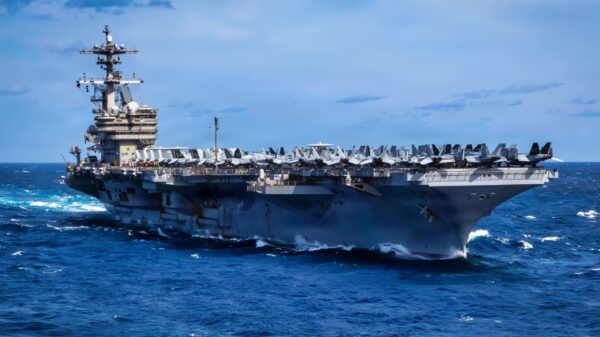 The Nimitz-class aircraft carrier USS George H.W. Bush (CVN 77) transits the Atlantic Ocean, Feb. 15, 2026. The George H.W. Bush Carrier Strike Group is at sea training as an integrated warfighting team. Composite Training Unit Exercise (COMPTUEX) is the Joint Force’s most complex integrated training event and prepares naval task forces for sustained high-end Joint and combined combat. Integrated naval training provides combatant commanders and America’s civilian leaders highly capable forces that deter adversaries, underpin American security and economic prosperity, and reassure Allies and partners. (U.S. Navy photo by Mass Communication Specialist 2nd Class Mitchell Mason)