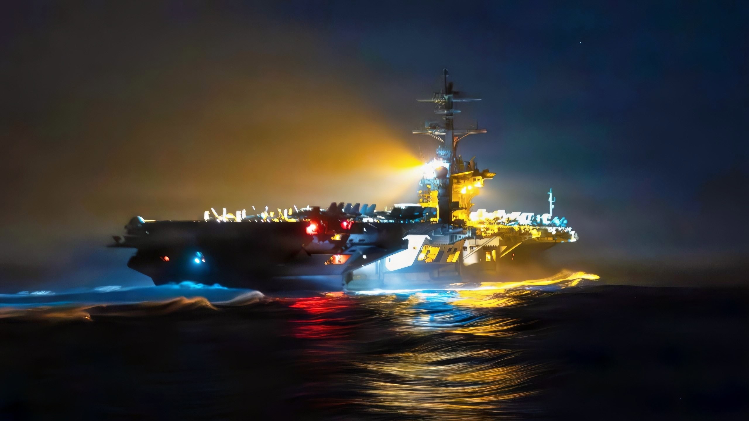 Nimitz-class aircraft carrier USS Abraham Lincoln (CVN 72) departs following a replenishment-at-sea with fleet replenishment oiler USNS Henry J. Kaiser (T-AO-187) during Operation Epic Fury, March 18, 2026. (U.S. Navy photo)