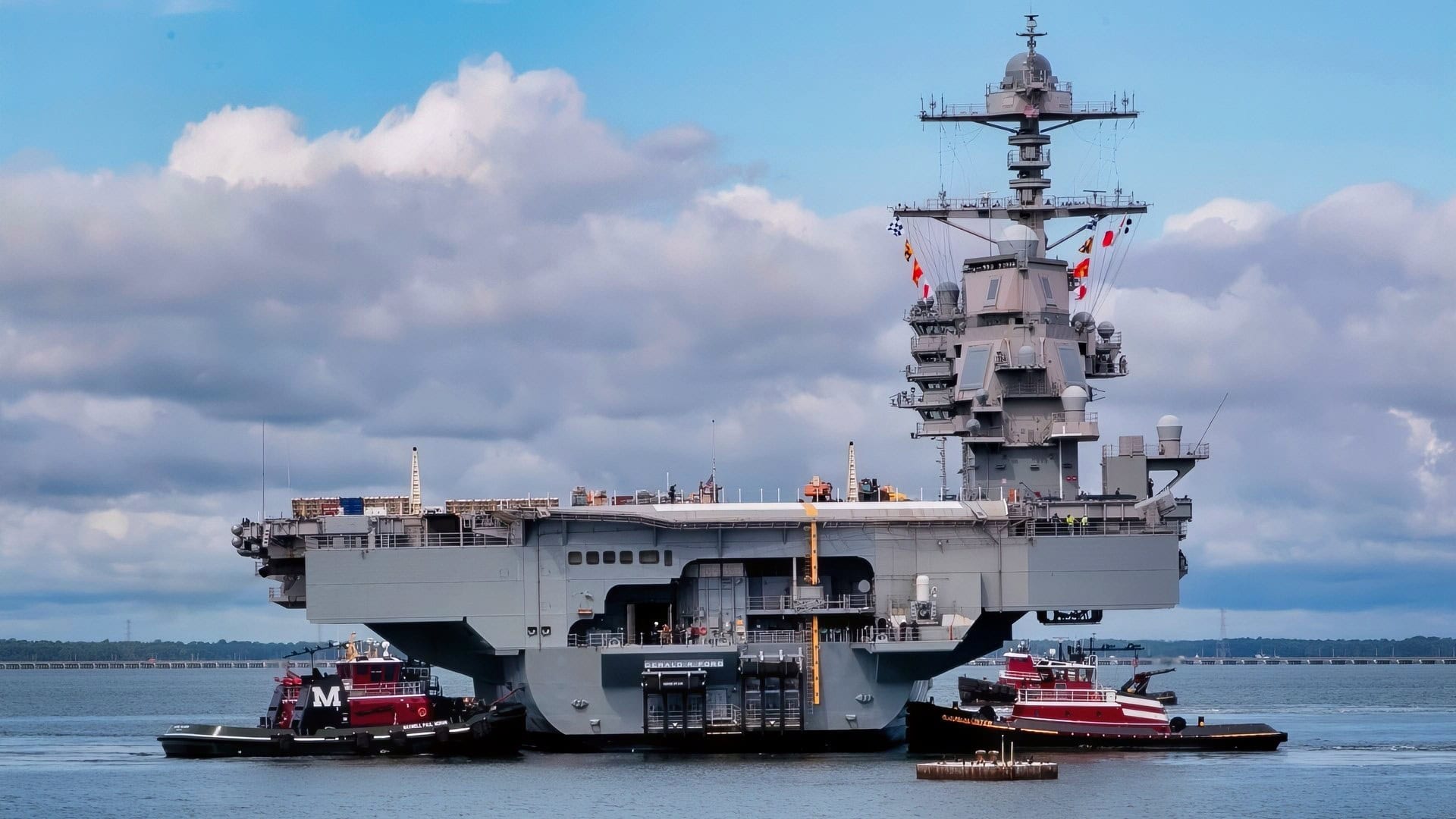 The aircraft carrier USS Gerald R. Ford (CVN 78) departed Naval Station Norfolk to make the transit to Newport News Shipyard in support of her Planned Incremental Availability (PIA), a six-month period of modernization, maintenance, and repairs, Aug. 20, 2021. (U.S. Navy photo by Mass Communication Specialist 1st Class Ryan Seelbach)