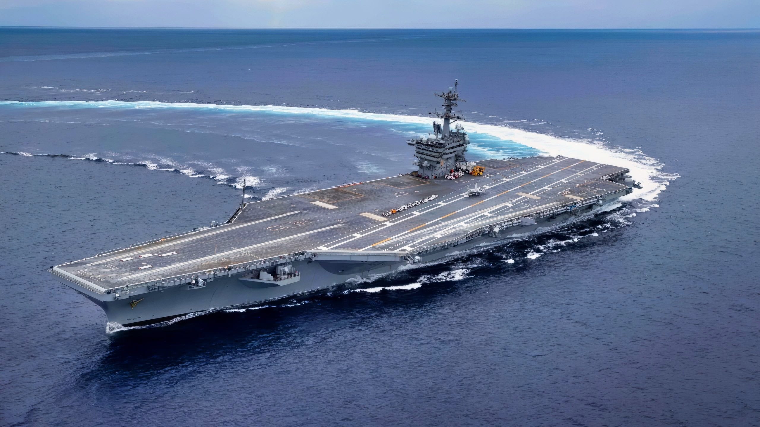 (May 11, 2017) Nimitz-class aircraft carrier USS Abraham Lincoln (CVN 72), conducts high-speed turn drills during sea trials. Abraham Lincoln is underway after successfully completing its mid-life refueling and complex overhaul and will spend several days conducting sea trials, a comprehensive test of many of the ship’s key systems and technologies. (U.S. Navy photo by Mass Communication Specialist 3nd Class Juan A. Cubano/Released)