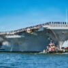 NAVAL STATION NORFOLK (March 31, 2026) The Nimitz-class aircraft carrier USS George H.W. Bush (CVN 77), the flagship of the George H.W. Bush Carrier Strike Group, departs Naval Station Norfolk to begin operations in support of its scheduled deployment, March 31, 2026. More than 5,000 personnel are assigned to the George H.W. Bush Carrier Strike Group. The George H.W. Bush Carrier Strike Group provides combatant commanders and America’s civilian leaders increased capacity to underpin American security and economic prosperity, deter adversaries, and project power on a global scale through sustained operations at sea. (U.S. Navy photo by Mass Communication Specialist 2nd Class Derek Cole)