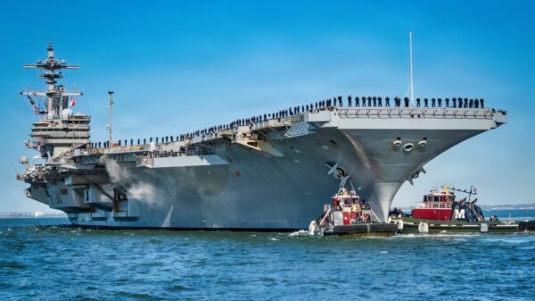 NAVAL STATION NORFOLK (March 31, 2026) The Nimitz-class aircraft carrier USS George H.W. Bush (CVN 77), the flagship of the George H.W. Bush Carrier Strike Group, departs Naval Station Norfolk to begin operations in support of its scheduled deployment, March 31, 2026. More than 5,000 personnel are assigned to the George H.W. Bush Carrier Strike Group. The George H.W. Bush Carrier Strike Group provides combatant commanders and America’s civilian leaders increased capacity to underpin American security and economic prosperity, deter adversaries, and project power on a global scale through sustained operations at sea. (U.S. Navy photo by Mass Communication Specialist 2nd Class Derek Cole)