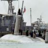 BAHRAIN (March 21, 2009) The Los Angeles-class attack submarine USS Hartford (SSN 768) arrives pier side at Mina Salman pier in Bahrain where U.S. Navy engineers and inspection teams will asses and evaluate damage that resulted from a collision with the amphibious transport dock ship USS New Orleans (LPD 18) in the Strait of Hormuz March 20. Overall damage to both ships is being evaluated. The incident remains under investigation. Hartford is deployed to the U.S. 5th fleet area of responsibility to support maritime security operations. (U.S. Navy photo by Cmdr. Jane Campbell/Released) (c)RoebuckPhoto