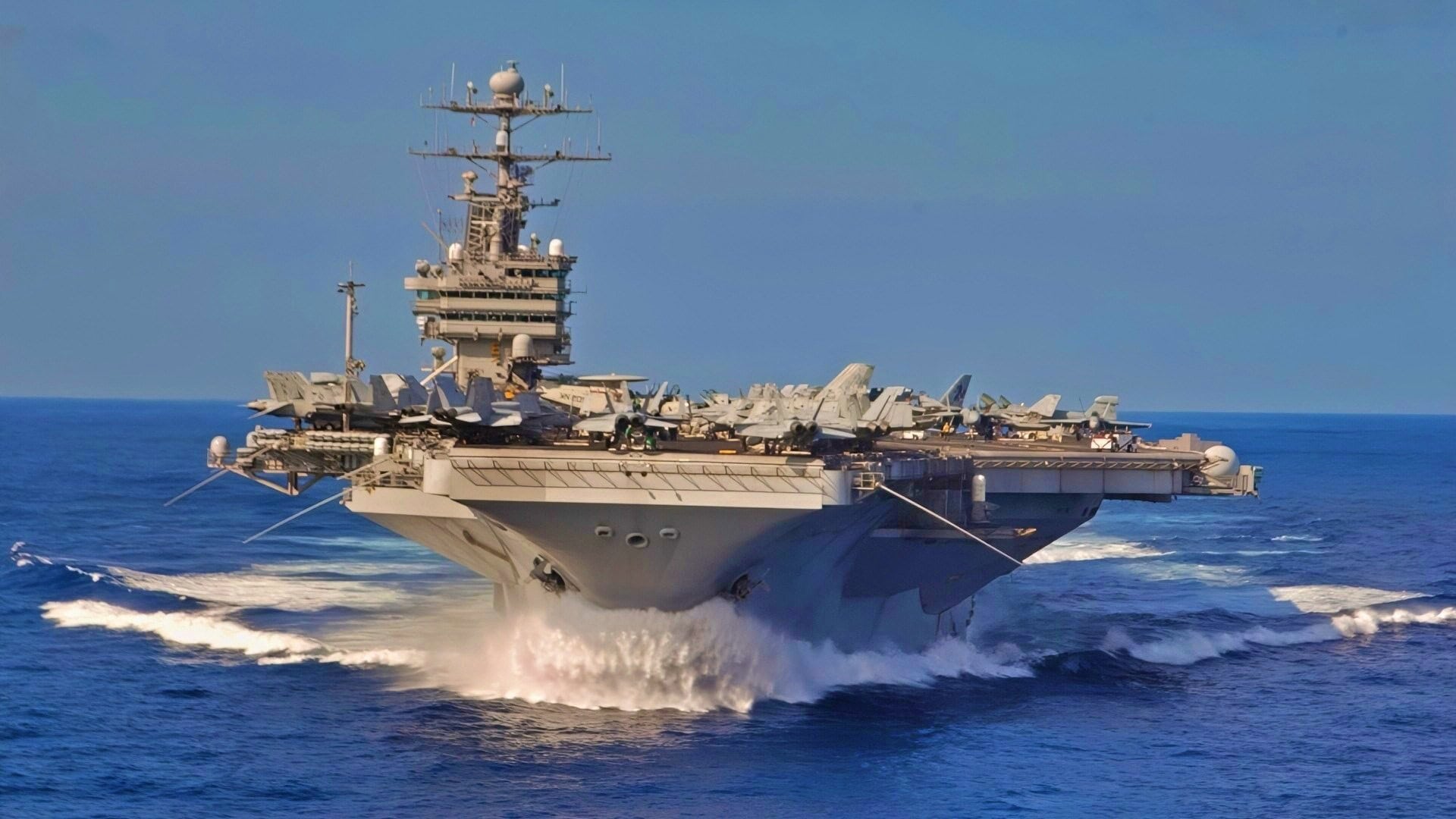 The aircraft carrier USS John C. Stennis (CVN 74) picks up speed as she steams through the western Pacific Ocean on Aug. 25, 2004. Stennis and her embarked Carrier Air Wing 14 are conducting exercises at sea on a regularly scheduled deployment.