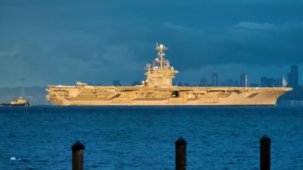 MANCHESTER, Wash. (November 3, 2017) USS John C. Stennis (CVN 74) transits Elliott Bay with Seattle in the background as it gets underway from Naval Base Kitsap's Puget Sound Naval Shipyard and Intermediate Maintenance Facility. Stennis is underway conducting training as it continues preparing for its next scheduled deployment. (U.S. Navy photo by Mass Communication Specialist 2nd Class Vaughan Dill/Released)