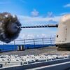 (July 29, 2025) The Ticonderoga-class guided-missile cruiser USS Princeton (CG 59) fires its forward Mark 45 5-inch gun during a weapons maintenance shoot, July 29, 2025. The Carl Vinson Carrier Strike Group is underway conducting routine operations in the U.S. 3rd Fleet area of operations. (U.S. Navy photo by Mass Communication Specialist 1st Class Jacob I. Allison)