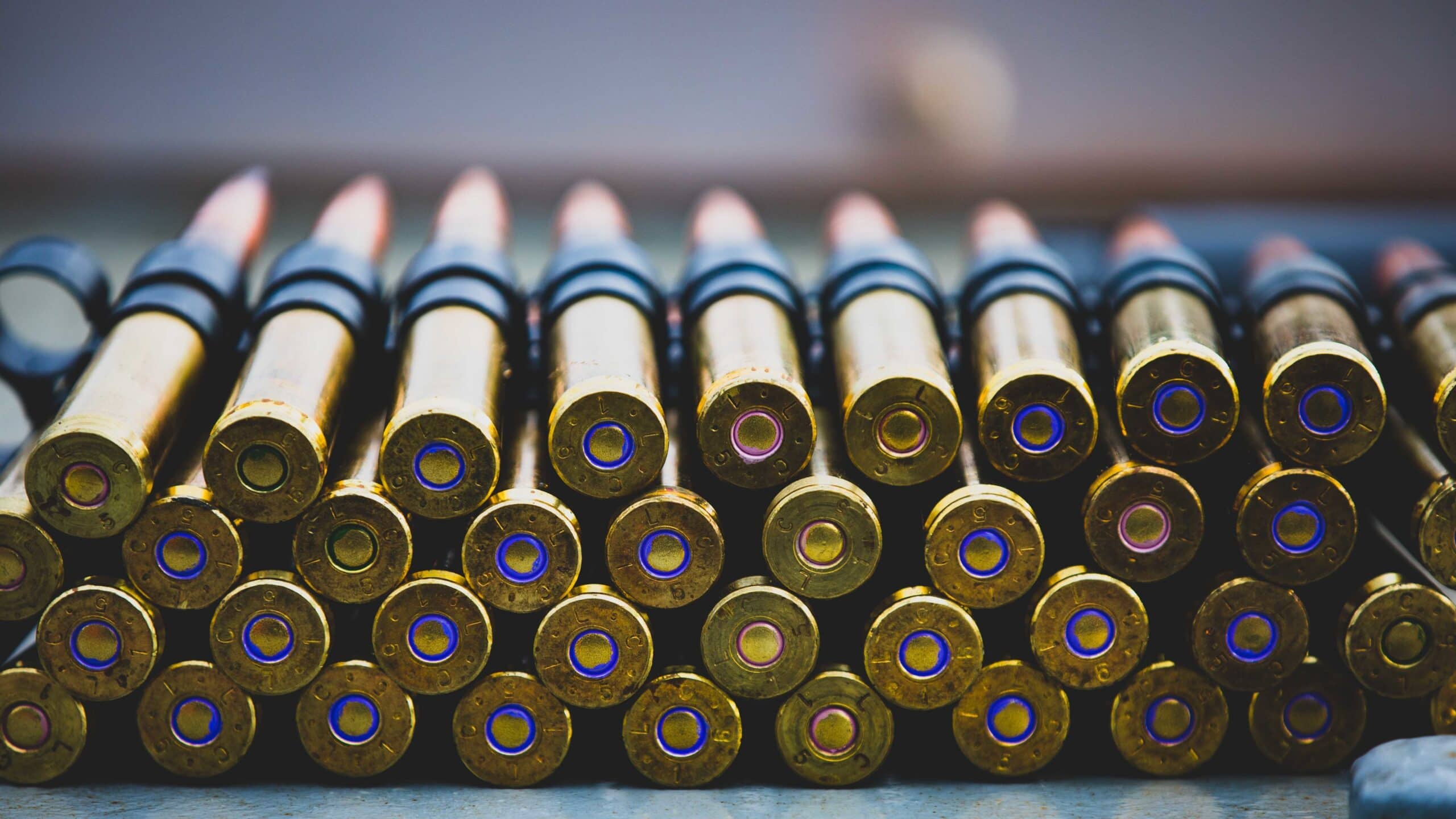 Ammunition is prepared for a .50 caliber machine gun during a live-fire crew certification exercise aboard the Arleigh Burke-class guided-missile destroyer USS Ramage (DDG 61) as part of the Gerald R. Ford Carrier Strike Group, Oct. 26, 2022. The first-in-class aircraft carrier USS Gerald R. Ford (CVN 78) is on its inaugural deployment conducting training and operations alongside NATO Allies and partners to enhance integration for future operations and demonstrate the U.S. Navy’s commitment to a peaceful, stable and conflict free Atlantic region. (U.S. Navy photo by Mass Communication Specialist 2nd Class Sawyer Connally)