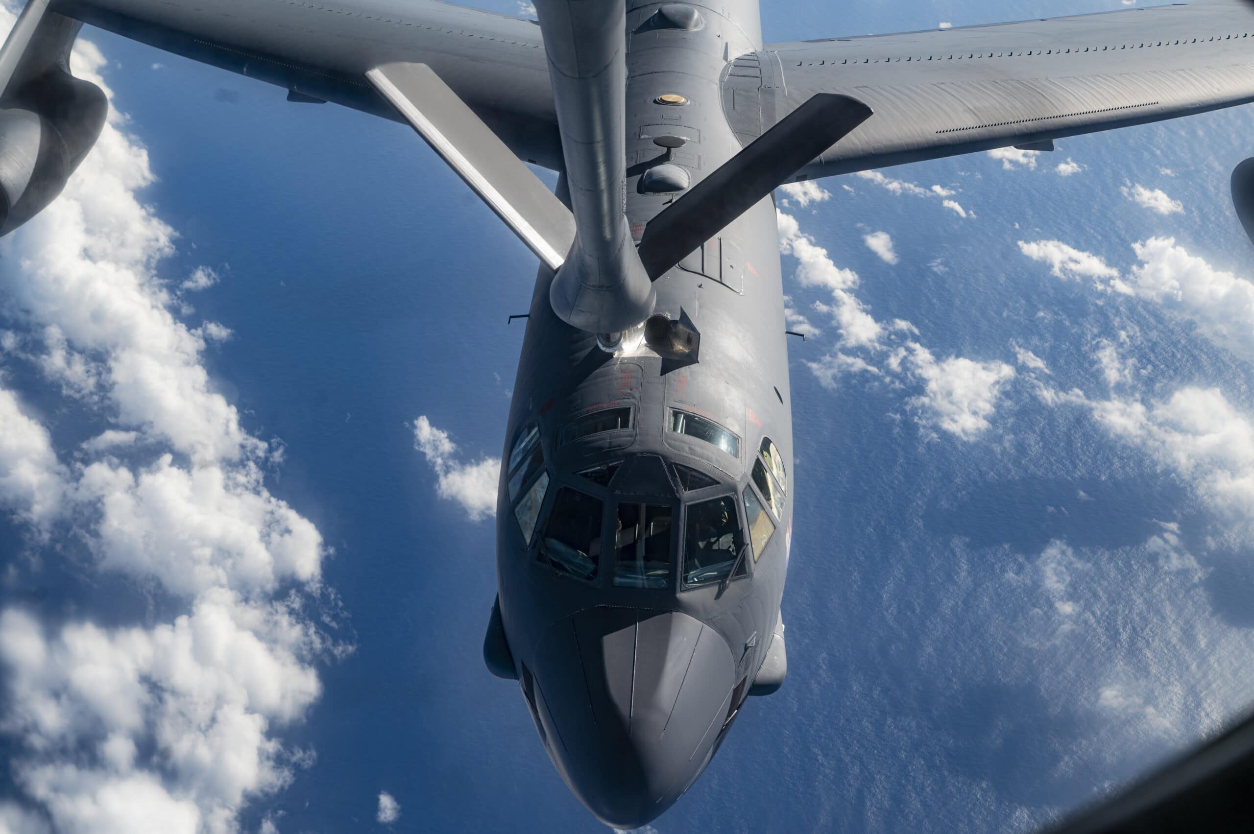 A U.S. Air Force KC-135 Stratotanker from Fairchild Air Force Base, Washington, refuels a B-52 Stratofortess from Barksdale Air Force Base, Louisiana, during a bomber task force mission over the Pacific Ocean, Dec. 17, 2022. BTF missions contribute to joint force lethality by demonstrating the U.S. Air Force’s ability to operate anywhere in the world.  (U.S. Air Force photo by 2nd Lt. Ariana Wilkinson)