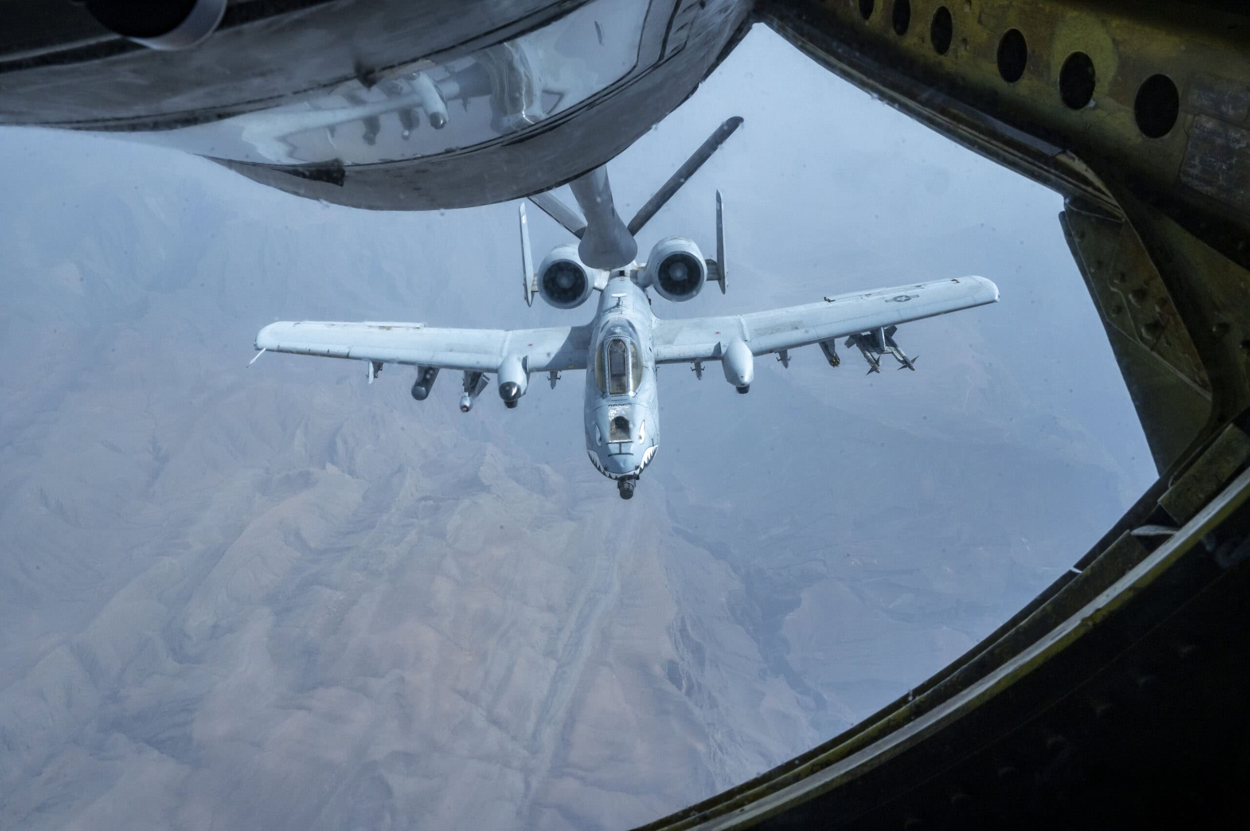 A U.S. Air Force A-10 Thunderbolt II from the 75th Expeditionary Fighter Squadron receives fuel from a KC-135 Stratotanker during air refueling operations above the Strait of Hormuz, July 21, 2023. In an ongoing effort to ensure the security and freedom of navigation in the region, U.S. Air Forces Central (AFCENT) reaffirms its unwavering commitment to maintaining stability and safeguarding global trade in this vital maritime route. (U.S. Air Force photo by Staff Sgt. Frank Rohrig)