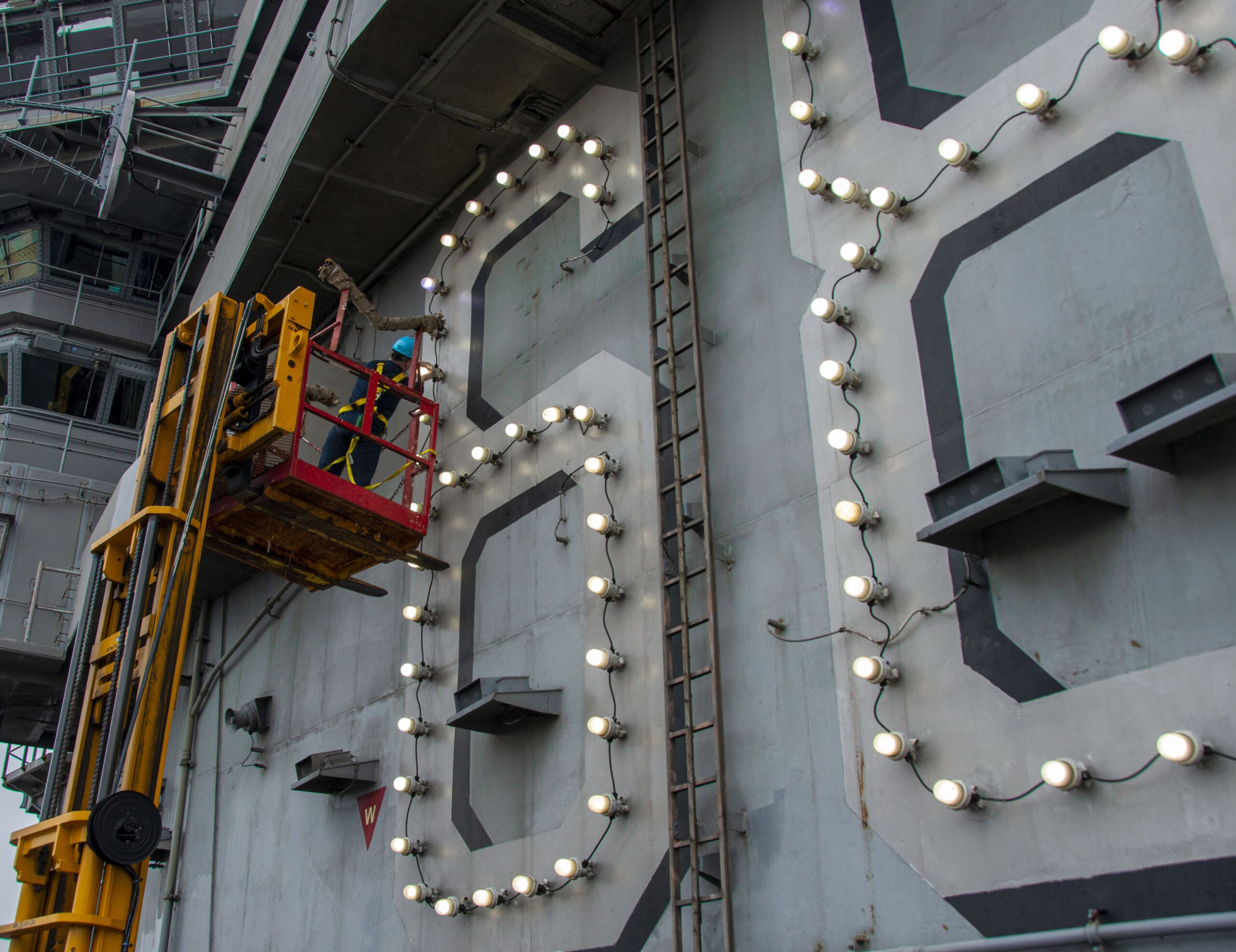 Sailor Repairs Mast Lights