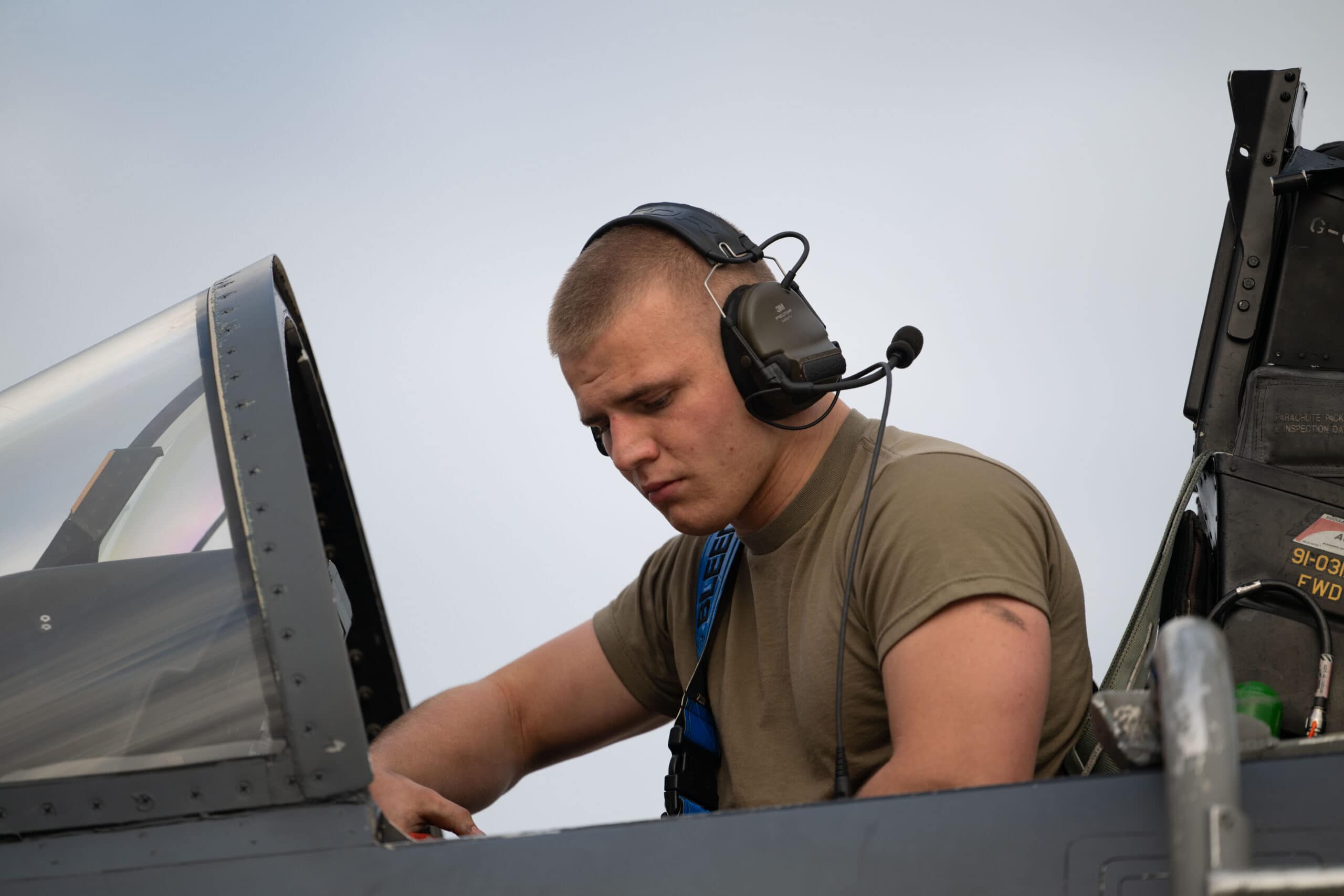 U.S. Air Force Airman 1st Class Colin Stocks, 492nd Fighter Generation Squadron electrical and environmental systems apprentice, performs post-flight inspections on a U.S. Air Force F-15E Strike Eagle for takeoff during Exercise Ocean Sky 25 at Gando Air Base, Spain, Oct. 23, 2025. Aircraft maintainers and crew chiefs supported this annual exercise, ensuring mission-ready aircraft and enabling seamless operations among Allied and partner nations. (U.S. Air Force photo by Staff Sgt. Elizabeth Davis)