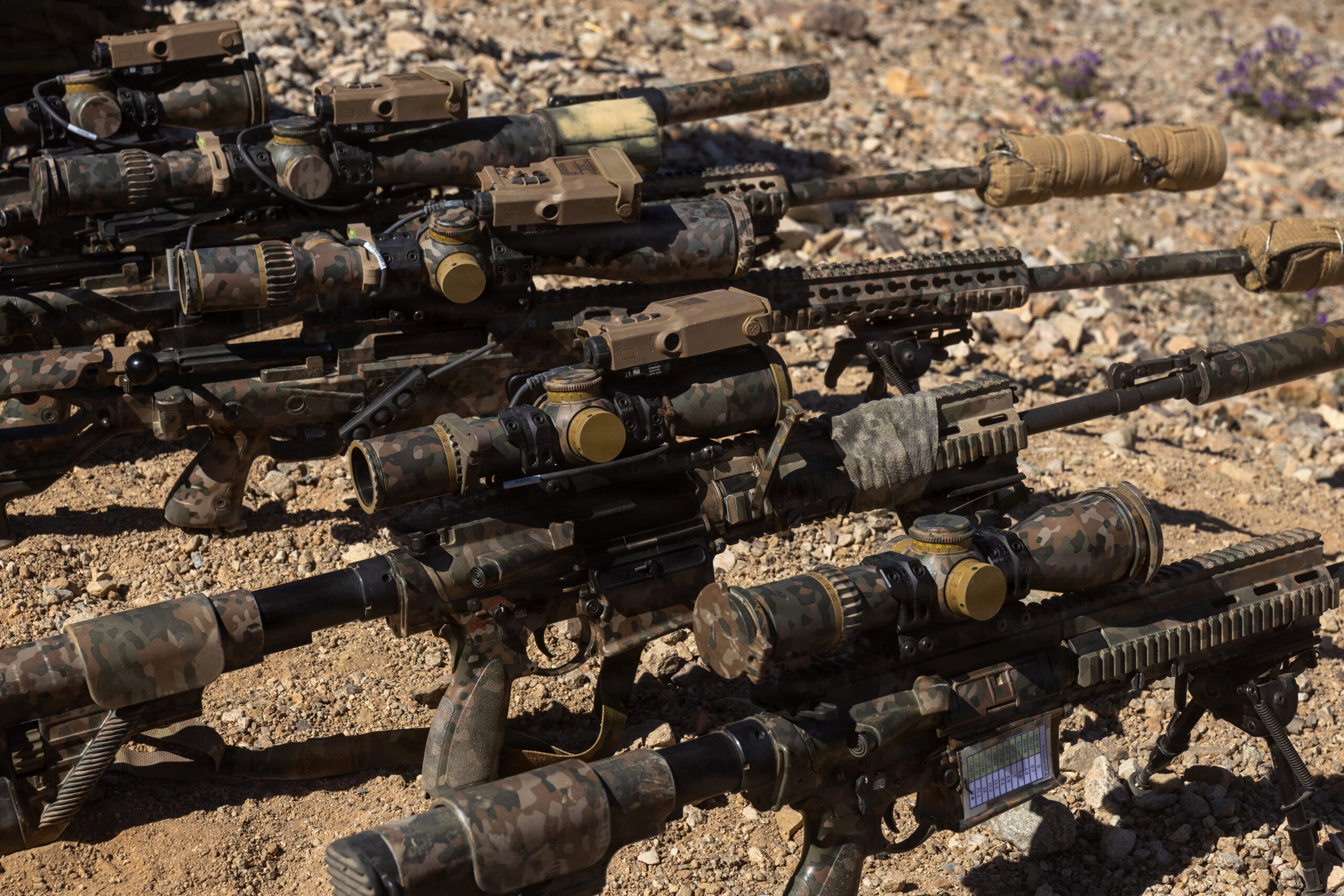 Rifles staged during a foreign training exercise as part of a live-fire exercise at Range 400, Marine Corps Air Ground Combat Center, Twentynine Palms, California, Feb. 13, 2026. The Netherlands Marine Corps visited MCAGCC to promote interoperability, strengthen partnerships and enhance strategic and tactical cooperation between U.S. and Dutch Marines. (U.S. Marine Corps photo by Lance Cpl. Jozef P. Majewski)