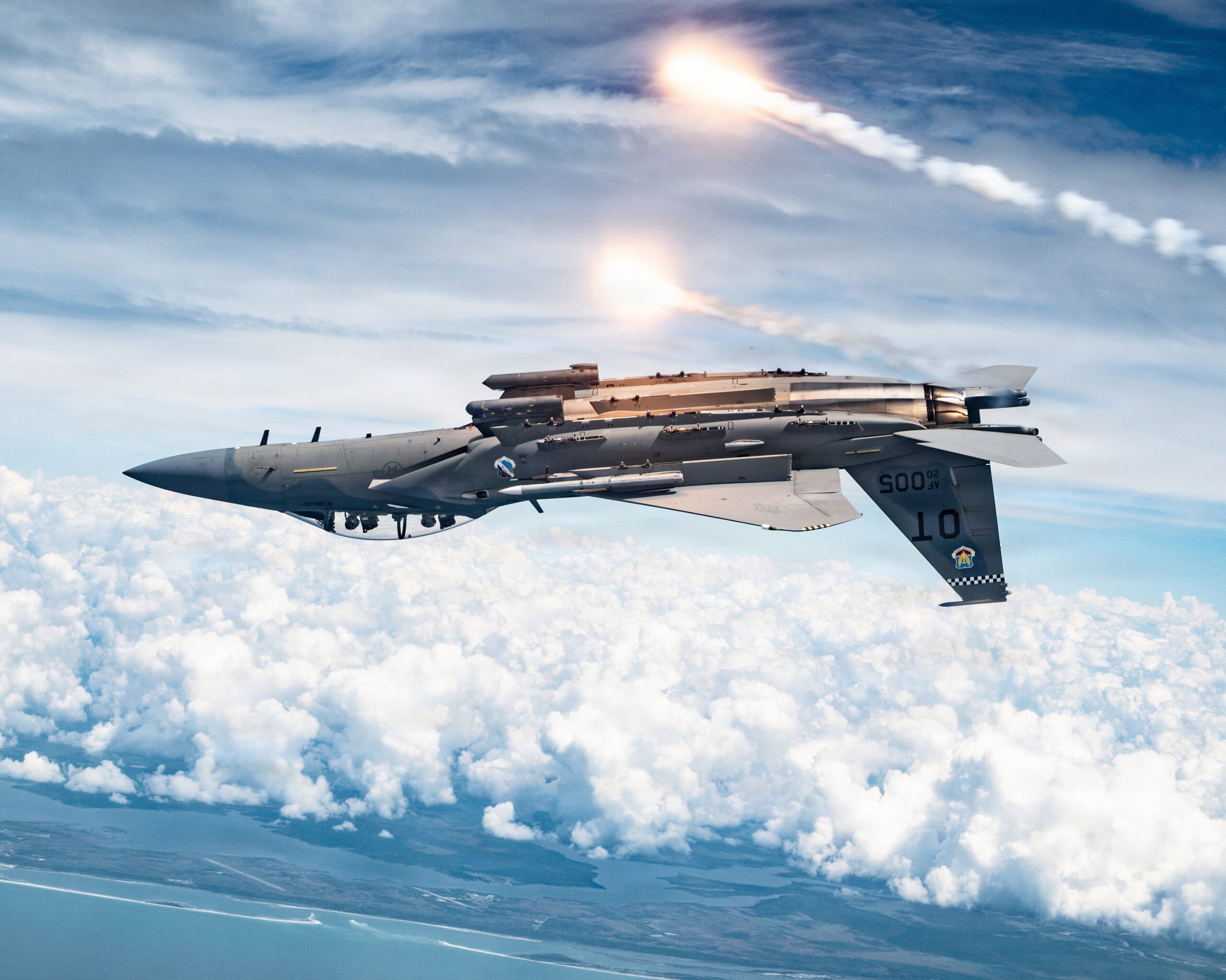 A U.S. Air Force F-15EX Eagle II assigned to Eglin Air Force Base, Florida, releases flares over the Gulf Coast, April 3, 2026. The 96th Test Wing and 53rd Wing perform developmental and operational test series on the platform including next-generation survivability, radars, sensors and networking capabilities. (U.S. Air Force photo by Tech Sgt Thomas Barley)