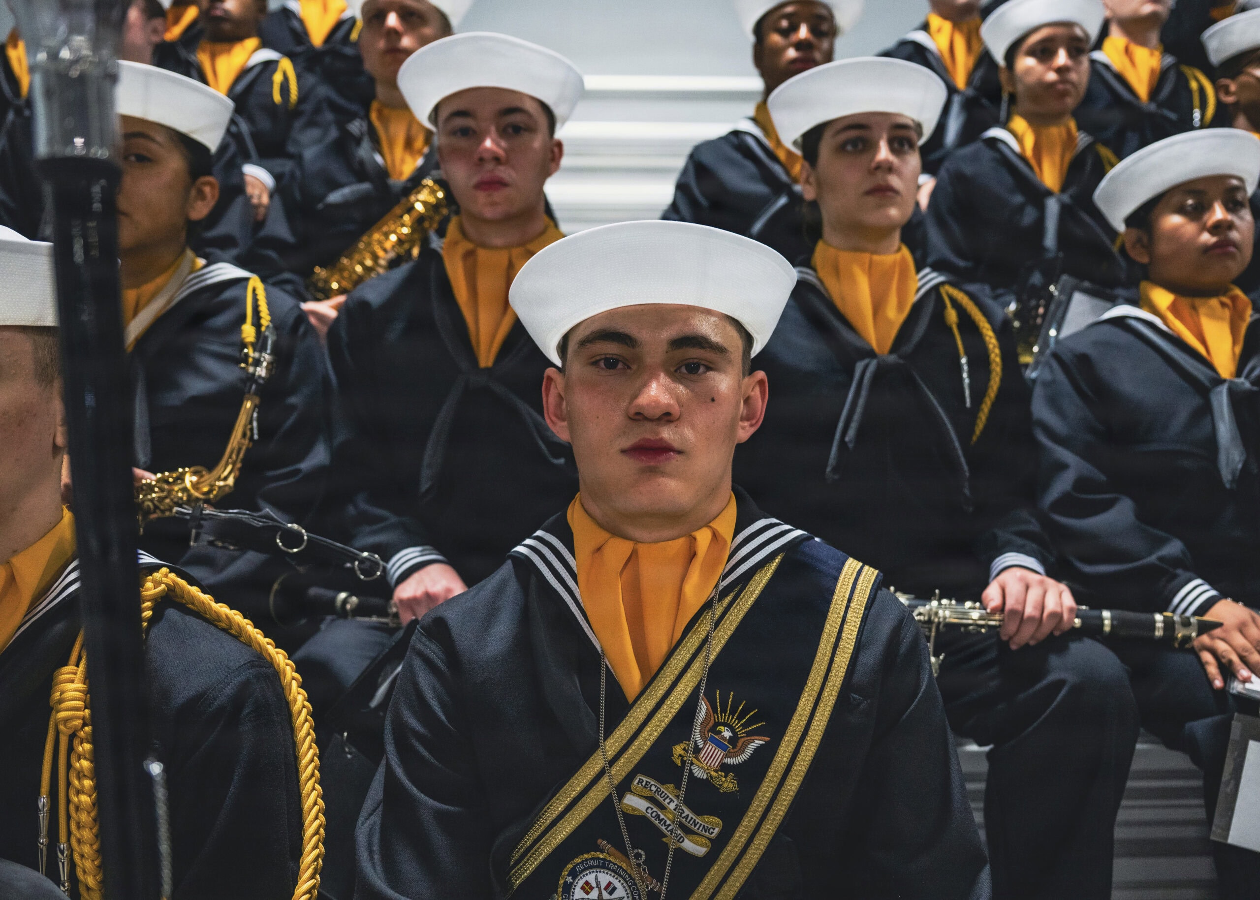 GREAT LAKES, Ill. (Apr. 09, 2026) – Recruits assigned to the recruit band performance unit wait to perform for the pass-in-review ceremony onboard Recruit Training Command (RTC), Apr. 09, 2026. Training is approximately nine weeks and all enlistees in the U.S. Navy begin their career at the command. More than 40,000 recruits train annually at the Navy’s only boot camp. (U.S. Navy photo by Mass Communication Specialist 2nd Class Stuart Posada)