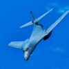 A U.S. Air Force B-1B Lancer attached to the 34th Bomb Squadron, Ellsworth Air Force Base, South Dakota, banks right with the wings in the swept position over the Pacific Ocean after taking off from Anderson Air Force Base, Guam, June 12, 2022. Bomber missions contribute to joint force lethality and deter aggression in the Indo-Pacific by demonstrating United States Air Force ability to operate anywhere in the world at any time in support of the National Defense Strategy. (U.S. Air Force Photo by Technical Sgt. Chris Hibben)