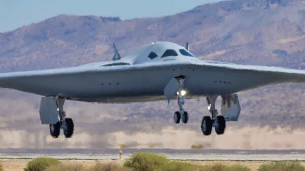 A B-21 Raider test aircraft lands at Edwards Air Force Base, Calif., during ongoing developmental flight testing, Sept. 11, 2025. The B-21 will be the backbone of the bomber fleet; it will incrementally replace the B-1 Lancer and B-2 Spirit bombers. (U.S Air Force photo by Todd Schannuth)