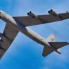 A U.S. Air Force B-52 Stratofortress aircraft, assigned to the 96th Bomb Squadron from Barksdale Air Force Base, Louisiana, flies over spectators at the Dubai Airshow 2025, Nov. 17, 2025, at the Al Maktoum International Airport in Dubai, United Arab Emirates. The B-52 flew from Rota, Spain, to participate in the event, showcasing U.S. airpower on a global stage. (U.S. Air Force photo by Staff Sgt. Tylin Rust)