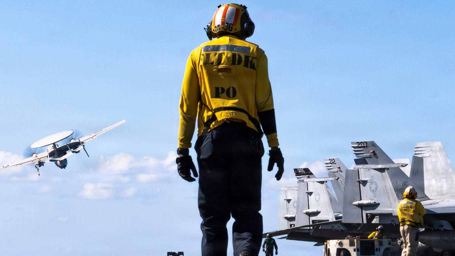 Aviation Boatswain’s Mate (Aircraft Handling) 2nd Class Jawan George transits the flight deck of the world's largest aircraft carrier, USS Gerald R. Ford (CVN 78), while underway in the Mediterranean Sea, April 6, 2026. Gerald R. Ford is on a scheduled deployment in the U.S. 6th Fleet area of operations to support the warfighting effectiveness, lethality and readiness of U.S. Naval Forces Europe-Africa, and defend U.S., Allied and partner interests in the region. (U.S. Navy photo by Mass Communication Specialist Seaman Paige Brown)