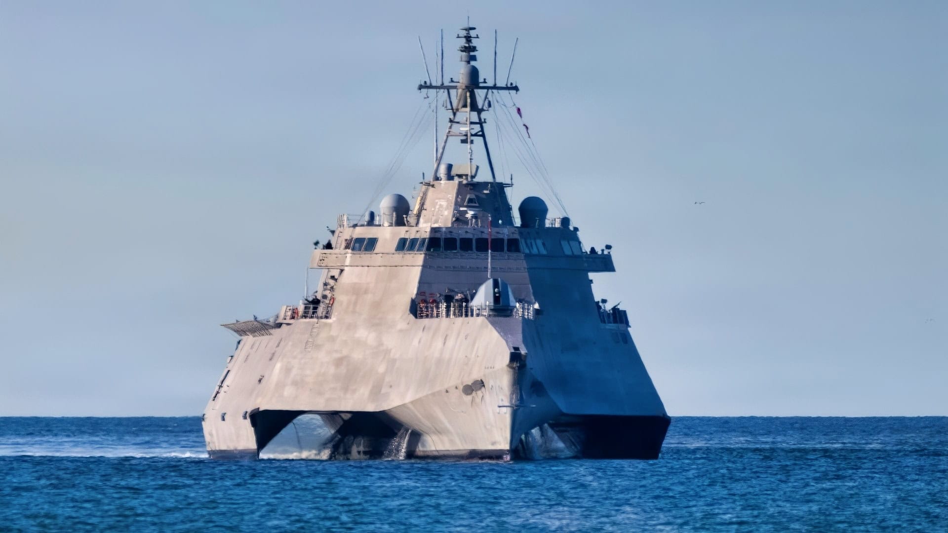 USS Kingsville (LCS 36) sails toward Naval Surface Warfare Center, Port Hueneme Division (NSWC PHD) in California on a recent morning as a flock of brown pelicans flies low over the Pacific Ocean. Homeported in San Diego, LCS 36 is an Independence-variant littoral combat ship that was commissioned in 2024. The arrival marked the ship’s first visit to NSWC PHD, where it underwent a Combat Systems Assessment Team event to ensure combat readiness. Designed to operate closer to shore than guided-missile destroyers and cruisers, USS Kingsville is outfitted for mine countermeasures missions. (U.S. Navy photo by Eric Parsons)