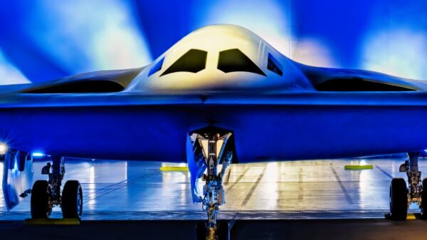 A B-21 Raider is unveiled at Northrop Grumman’s manufacturing facility on Air Force Plant 42 in Palmdale, California, Dec. 2, 2022. The B-21 will be a long-range, highly survivable, penetrating strike stealth bomber capable of delivering both conventional and nuclear munitions. (U.S. Air Force photo by Airman 1st Class Joshua M. Carroll)