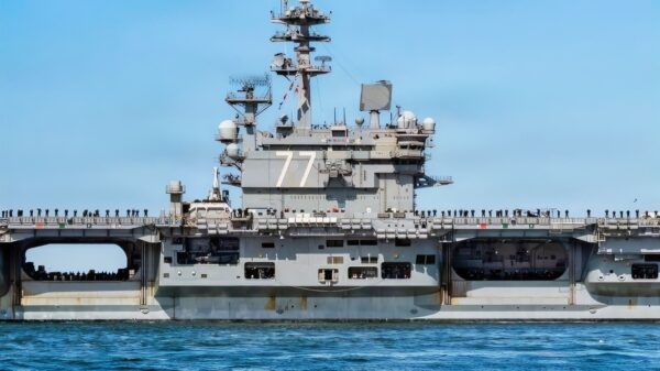 NAVAL STATION NORFOLK (March 31, 2026) The Nimitz-class aircraft carrier USS George H.W. Bush (CVN 77), the flagship of the George H.W. Bush Carrier Strike Group, departs Naval Station Norfolk to begin operations in support of its scheduled deployment, March 31, 2026. More than 5,000 personnel are assigned to the George H.W. Bush Carrier Strike Group. The George H.W. Bush Carrier Strike Group provides combatant commanders and America’s civilian leaders increased capacity to underpin American security and economic prosperity, deter adversaries, and project power on a global scale through sustained operations at sea. (U.S. Navy photo by Mass Communication Specialist 2nd Class Derek Cole)