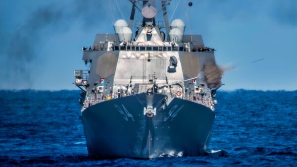 The guided missile destroyer USS Nitze (DDG 94) fires its MK-45 5 inch gun during a Surface Warfare Advanced Tactical Training (SWATT) exercise. Nitze is part of Destroyer Squadron (DESRON) 26 which supports Carrier Strike Group (CSG) 10. SWATT is led by the Naval Surface and Mine Warfighting Development Center (SMWDC) and is designed to increase warfighting proficiency, lethality, and interoperability or participating units. (U.S. Navy photo by Mass Communication Specialist 3rd Class Bryan Valek)
