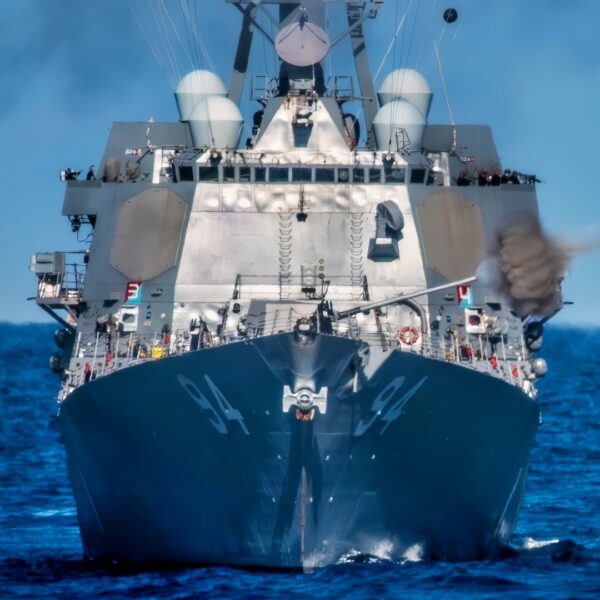 The guided missile destroyer USS Nitze (DDG 94) fires its MK-45 5 inch gun during a Surface Warfare Advanced Tactical Training (SWATT) exercise. Nitze is part of Destroyer Squadron (DESRON) 26 which supports Carrier Strike Group (CSG) 10. SWATT is led by the Naval Surface and Mine Warfighting Development Center (SMWDC) and is designed to increase warfighting proficiency, lethality, and interoperability or participating units. (U.S. Navy photo by Mass Communication Specialist 3rd Class Bryan Valek)