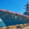 (April 11, 2026) – Sailors man the rails aboard the Navy’s newest Arleigh Burke-class guided-missile destroyer USS Harvey C. Barnum Jr. (DDG 124) during the commissioning ceremony in Norfolk, Virginia, April 11, 2026. The warship bears the name of a living Medal of Honor recipient, retired Col. Harvey C. “Barney” Barnum Jr. (U.S. Navy photo by Mass Communication Specialist 1st Class Theoplis Stewart)
