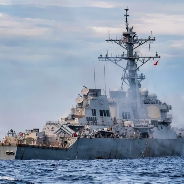 SOUTH CHINA SEA (Nov. 24, 2019) The mark 45 5 inch gun is fired from the forecastle of the Arleigh Burke-class guided-missile destroyer USS Milius (DDG 69) during a live-fire gunnery exercise. Milius is underway conducting operations in the Indo-Pacific region while assigned to Destroyer Squadron (DESRON) 15, the Navy’s largest forward-deployed DESRON and the U.S. 7th Fleet’s principal surface force. (U.S. Navy photo by Mass Communication Specialist 2nd Class Taylor DiMartino)