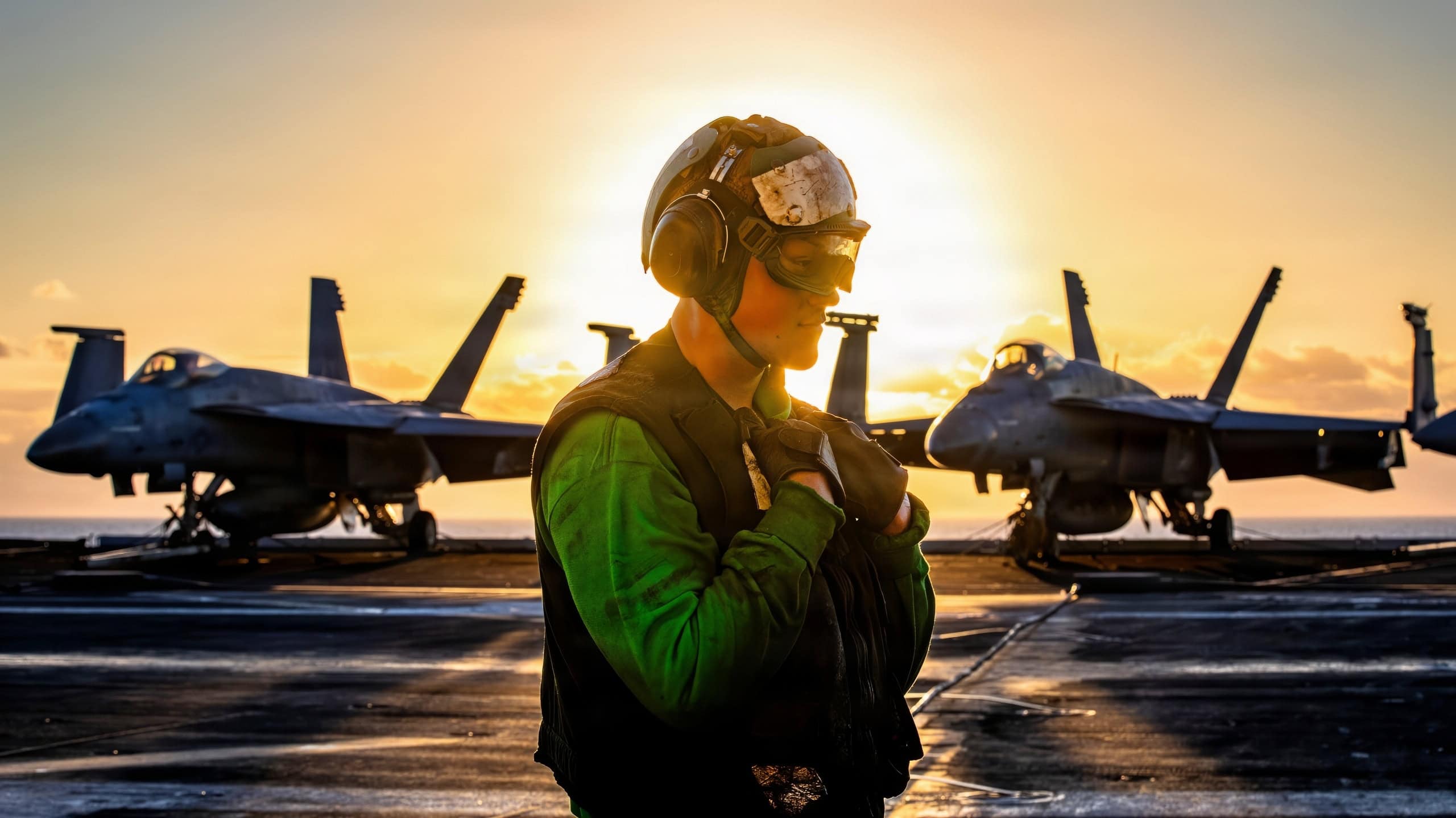 A U.S. Sailor observes flight deck operations on the flight deck of the world's largest aircraft carrier, USS Gerald R. Ford (CVN 78), during Operation Epic Fury, Feb. 28, 2026. (U.S. Navy photo)