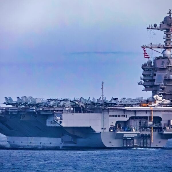 The first-in-class aircraft carrier USS Gerald R. Ford (CVN 78) steams in formation with the Gerald R. Ford Carrier Strike Group and other coalition warships during a formation transit, Oct. 25, 2022. Ford is on its inaugural deployment conducting training and operations alongside NATO Allies and partners to enhance integration for future operations and demonstrate the U.S. Navy’s commitment to a peaceful, stable and conflict free Atlantic region. (U.S. Navy photo by Mass Communication Specialist 2nd Class Sawyer Connally)