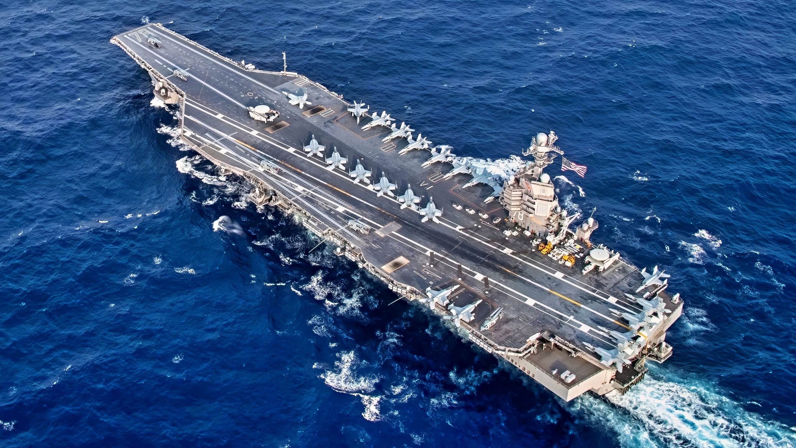 The Ford-class aircraft carrier USS Gerald R. Ford (CVN 78) and the Nimitz-class aircraft carrier USS Harry S. Truman (CVN 75) transit the Atlantic Ocean June 4, 2020, marking the first time a Ford-class and a Nimitz-class aircraft carrier operated together underway. Ford is underway conducting integrated air wing operations, and the Harry S. Truman Carrier Strike Group remains at sea in the Atlantic as a certified carrier strike group force ready for tasking in order to protect the crew from the risks posed by COVID-19, following their successful deployment to the U.S. 5th and 6th Fleet areas of operation. (U.S. Navy photo by Mass Communication Specialist Seaman Riley McDowell)