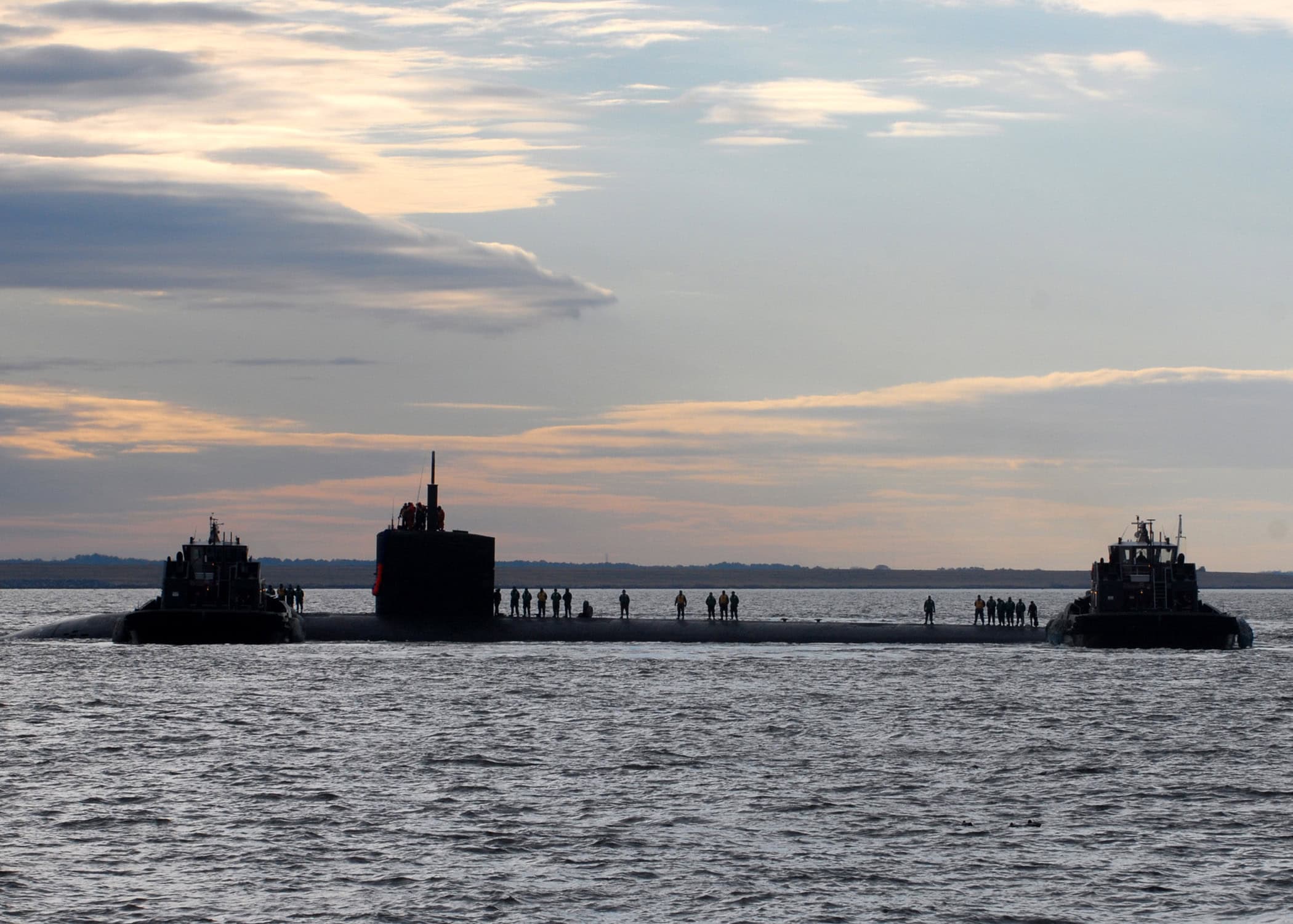 101222-N-7179M-058
NORFOLK (Dec. 21, 2010) The Los Angeles-class submarine USS Boise (SSN 764) returns to homeport at Naval Station Norfolk after a scheduled six-month deployment. Boise conducted operations in the U.S. European Command area of responsibility, supporting national security interests and maritime security operations. (U.S. Navy photo by Mass Communication Specialist 2nd Class Danna M. Morris/Released)