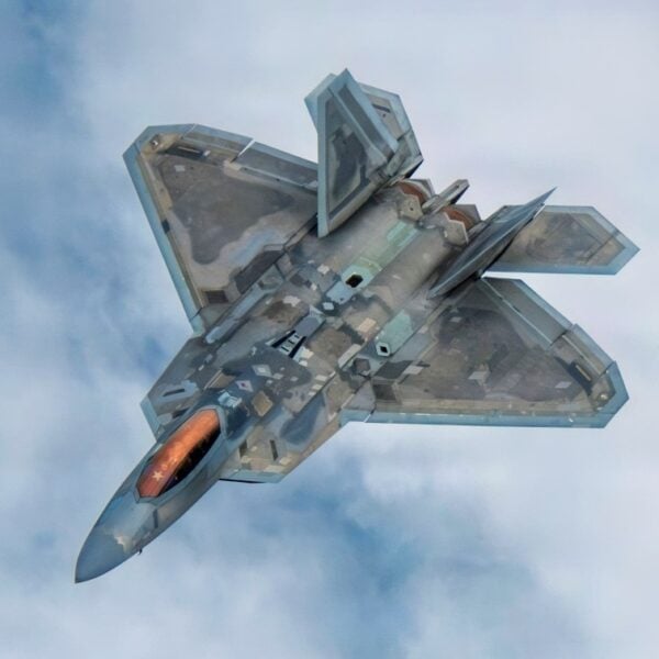 A U.S. Air Force F-22 Raptor assigned to the 154th Wing, Hawaii Air National Guard, takes part in a multi-ship formation off the coast of Hawaii, Jan. 5, 2026. The aircraft participated in a comprehensive training sortie designed to integrate the 154th Operations Group’s distinct mission sets, including air superiority and aerial refueling, to ensure peak mission readiness in the Indo-Pacific theater. (U.S. Air National Guard photo by Senior Master Sgt. Mysti Bicoy)