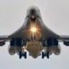 A U.S. Air Force B-1B Lancer assigned to the 345th Expeditionary Bomb Squadron, decends for landing at Ørland Air Base, Norway, during a Bomber Task Force Europe deployment, Aug. 9, 2025. The BTF mission highlights how we deliver effects rapidly across dynamic and contested environments through integrated training. (U.S. Air Force photo by Staff Sgt. Tambri Cason)