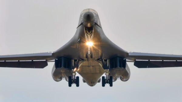 A U.S. Air Force B-1B Lancer assigned to the 345th Expeditionary Bomb Squadron, decends for landing at Ørland Air Base, Norway, during a Bomber Task Force Europe deployment, Aug. 9, 2025. The BTF mission highlights how we deliver effects rapidly across dynamic and contested environments through integrated training. (U.S. Air Force photo by Staff Sgt. Tambri Cason)