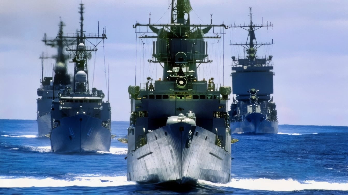 A bow view of the ships composing the battleship USS MISSOURI (BB-63) battle group participating in the multinational Exercise RIMPAC '88. They are, front to back: the frigate USS COOK (FF-1083), the guided missile frigate USS MCCLUSKY (FFG-41), the destroyer USS JOHN YOUNG (DD-973) and the nuclear-powered guided missile cruiser USS LONG BEACH (CGN-9).